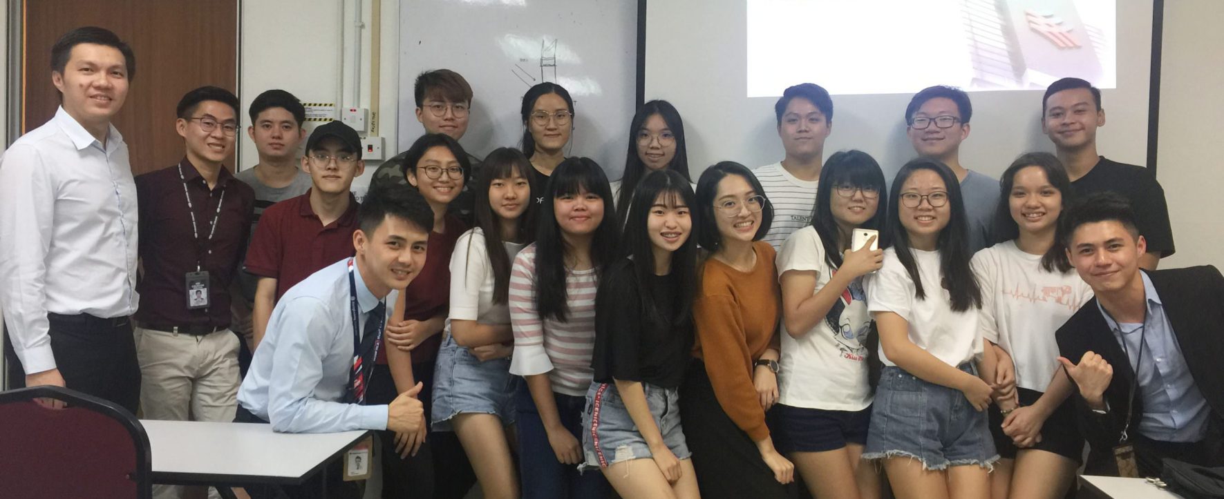 Mr Daniel (corner right in blue) sharing with the students on the Hong Leong Scholarship